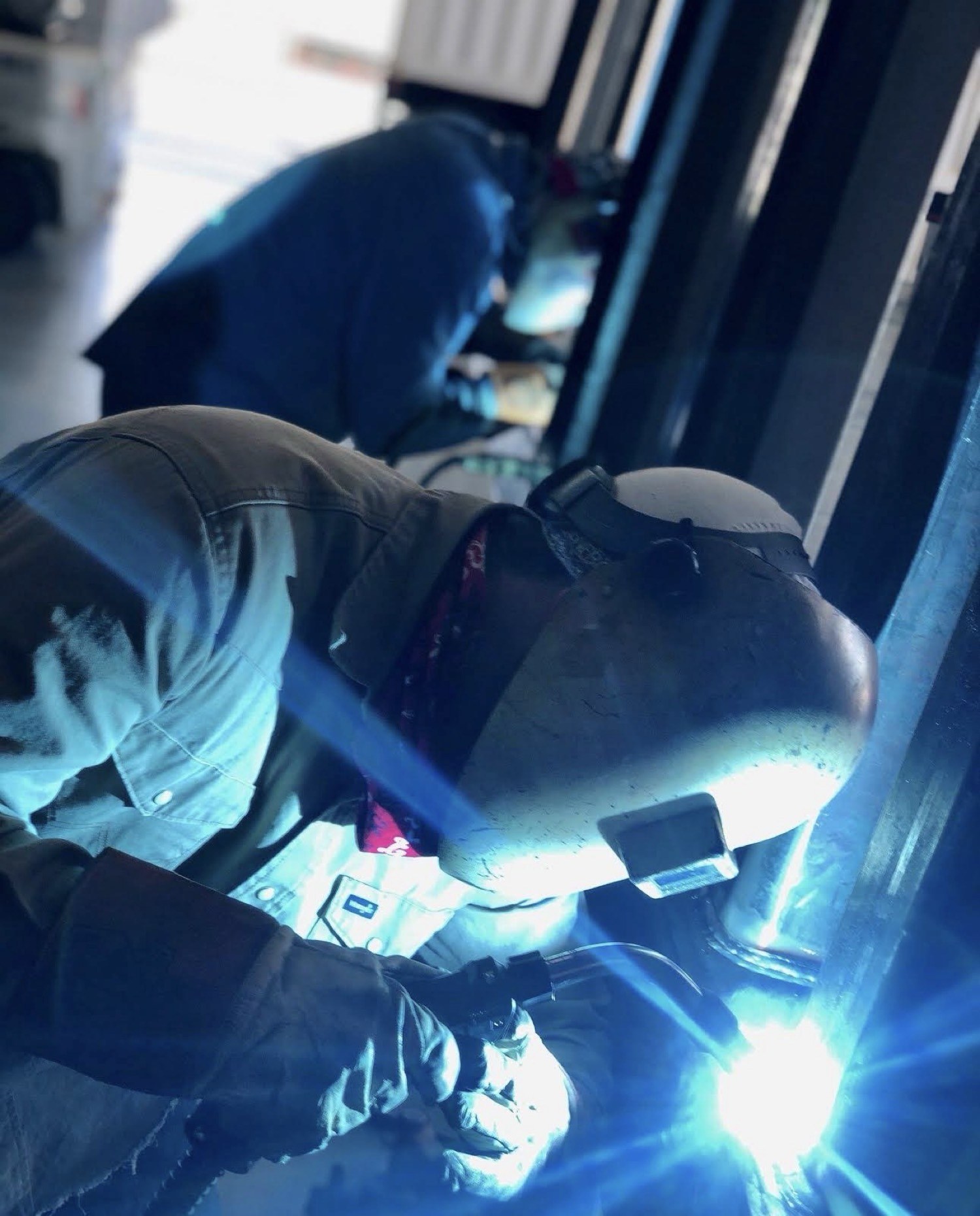 Welder laying a bead in the TSR Metal Works shop